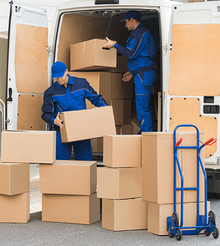 Two Men Taking Out Boxes From a Truck